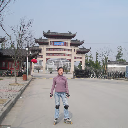 Family_Pics-015 Hanhan at the University gate. A traditional Chinese architecture.