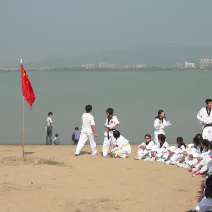 Taekwondo_Outing-011 Sitting in a circle to watch performances.