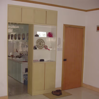 The living room looking into the kitchen. The living room looking into the kitchen.