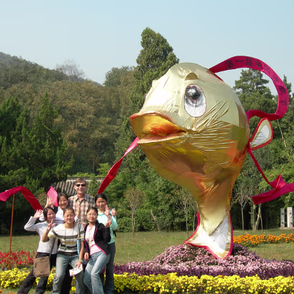 Tourism_Student_Outing-030 Me, students, and the Festival mascot. Nothing says 'poems' like a big golden carp...