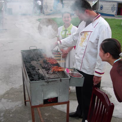 Tony's_Birthday-005 Hanhan watching the delicious BBQ being prepared.