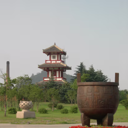 Zhu_Ran-006 The perforated stone thing is an incense burner.