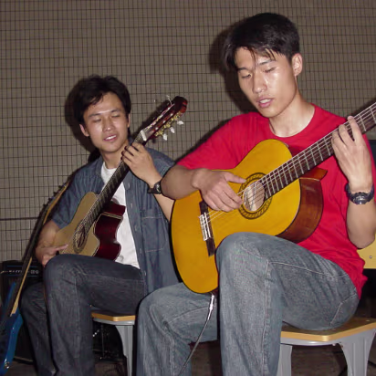 Random-026 These students are helping celebrate their school's 100th anniversary.