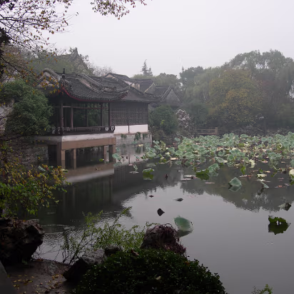 Mudu-003 The female compound of the Zhang family looks over a nice pond.