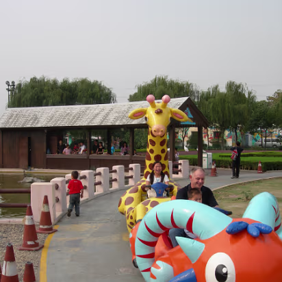 Suzhou-2006-15 Tony, Ben, and Hanhan having an accident on their mighty steeds!