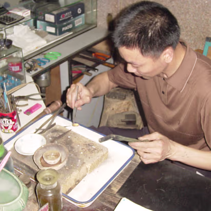 Rings-02 The ring is cooled now and is ready for final shaping and polishing. Very cool, watching our rings being made.