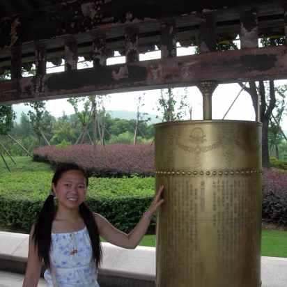 Ling-Shan-07 Hanhan and one of 108 prayer wheels.