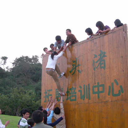 MidAutumnFest2006-15 Have to get everyone on the team over a 4 meter (15 foot) wall.