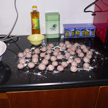 Spring-Festival-2007-010 A few of the 200+ meatballs ready for frying.