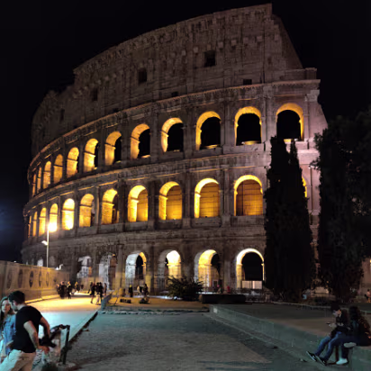 Italy-041 We walked around the area after eating too much. The Colosseum by night is quite beautiful.