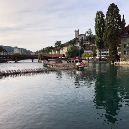 Switzerland-029 A needle dam and another covered bridge. A needle dam has many small wickets that look like paddles so you can control the flow much more closely. The old city...