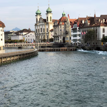 Switzerland-035 A view back towards town looking at the dam and an old church.