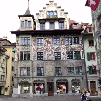 Switzerland-038 Most of the buildings around the many small squares are elaborately decorated.