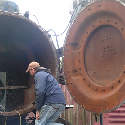 Autumn_2009-016 One of the guys who showed us everything about restoring the engine.