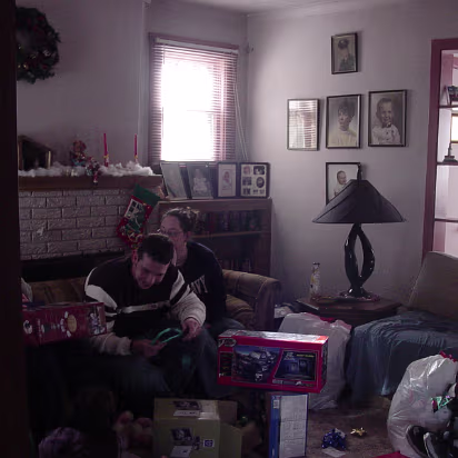 Christmas_2003-010 Jason seems to be happy with what Santa brought for him!