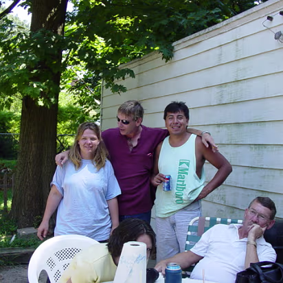 Family-004 My niece Angie and her husband Mario with me. Eddie is about to go to sleep in the lawn chair.