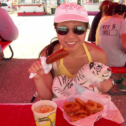 HOIFair_2007-010 Eating again! Lemon shake-up, corn dog, and onion rings.