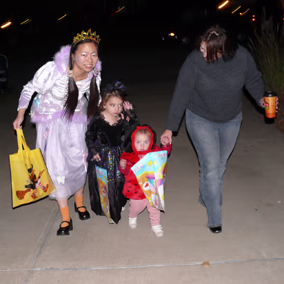 Halloween_2007-010 Trick or treat team heading to another house.