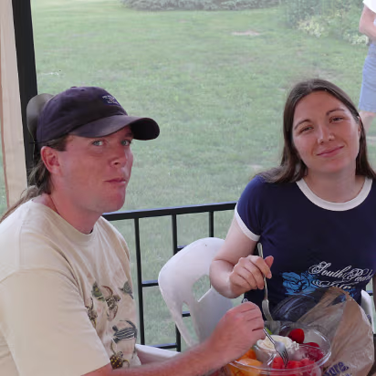 Independence_Day-017 Scott and Susan enjoying a cool snack of fruit and dip.