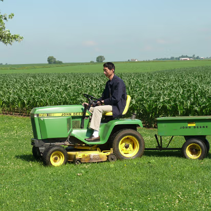 July_2009-022 Here's Farmer Zhang on his tractor.