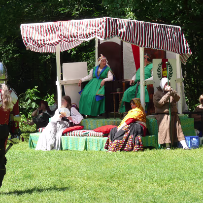Olde_English_Faire-016 Ladies in waiting and the wizard are always nearby.