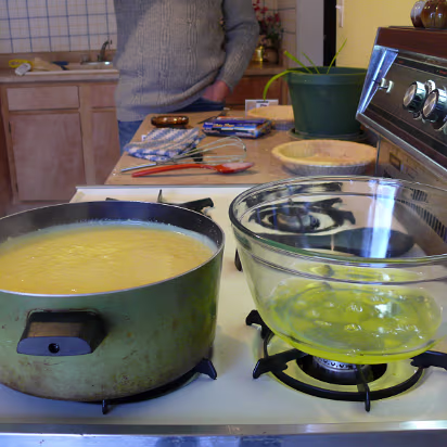 Thanksgiving_2007-003 The pie filling is cooking while the egg whites are warming to be whipped.