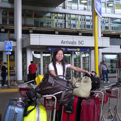 USA_Move-010 Hanhan in front of Chicago O'Hare arrivals. We have arrived!