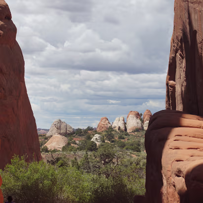 Arches_NP-060 Looking through rock at rocks.