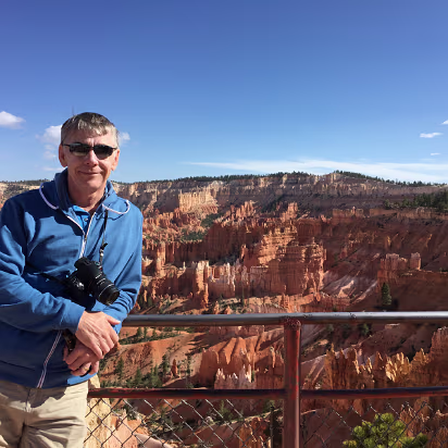 Bryce_Canyon_NP-074 Hanging out for a few more minutes to enjoy the view. What a nice day, blue skies, a few puffy clouds, not too hot.