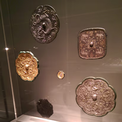 Christmas_2015_Trip-009 Chinese bronze mirrors from 1800+ years ago. These are usually found in graves.