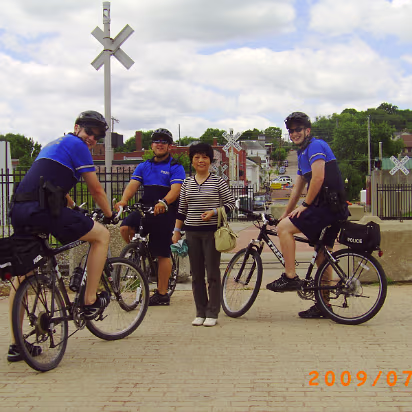 Hanibal_2009-004 Mom with bike police, she likes the fat one!