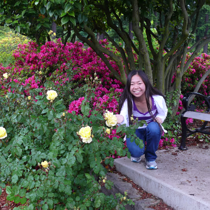 Area-018 Yellow roses and girl. Both pretty, one smells nice.